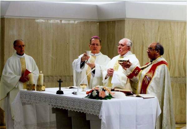 Bishop Fernando Rifan concelebrates with Pope Francis