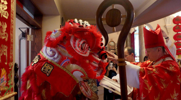 Archbishop Blase Culpich blesses Chinese New Year 1