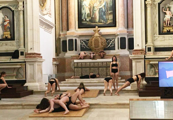 Women in underwear draping themselves over the altar in Leiria - 1