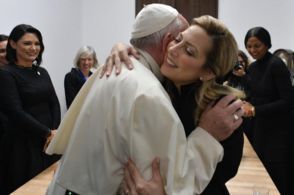 Pope Francis embraces Fabiola Yanez
