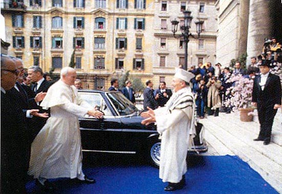 John Paul II eagerly greeting the rabbi of Rome