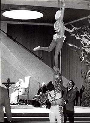 immodestly dressed acrobats perform for John Paul II in the Vatican