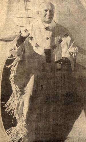 John Paul II emerges from a tribal tepee