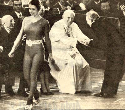 A female acrobat in a skintight leotard just after greeting Pope John Paul II