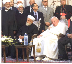 John paul II without shoes in the company of Muslims