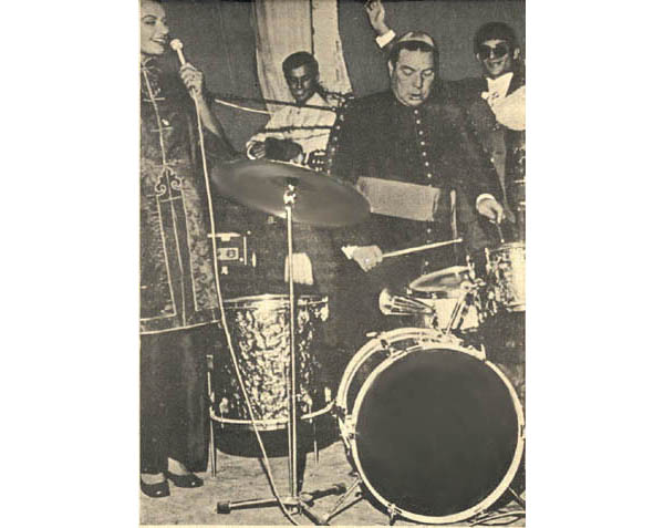 Bishop Horlando Arce Moya playing the drums
