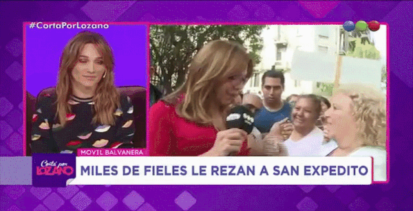 GIF of transsexual 'Liza' receiving communion on television in Beunos Aires