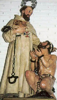 A statue of St. John of Matha freeing a captive