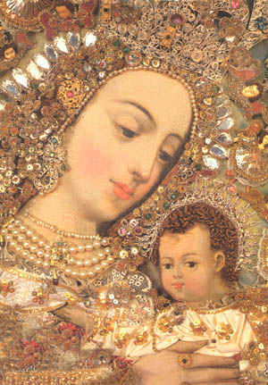 A picture of Our Lady decorated with gold and jewels