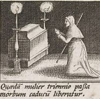 praying at tomb