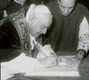 John XXIII signing Humanae salutis