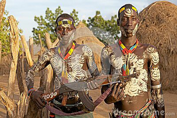 primitive African natives wielding an AK-47