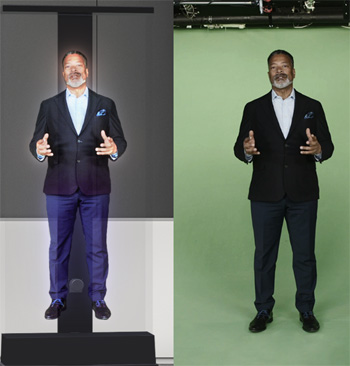 A man on the right and his projected hologram on the left