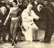 Saint Wojtyla greeting circus performers in leotards