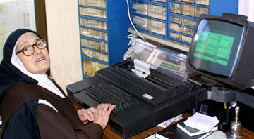 Sister Lucy at a Computer