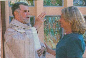 Married priest blesses wife