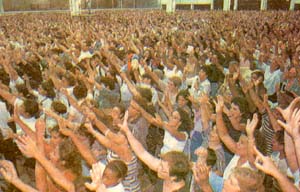 Brazilian charismatics waving their arms