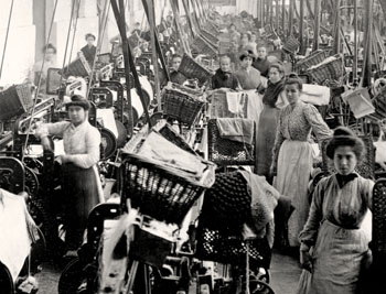Black and white picture of women working in a garment factory