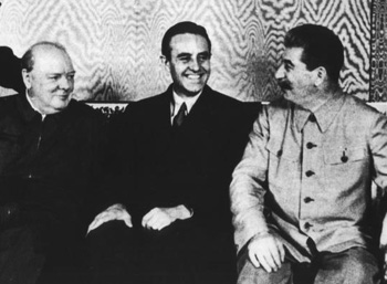 Black and white photograph of Harriman, Stalin, and Churchhill