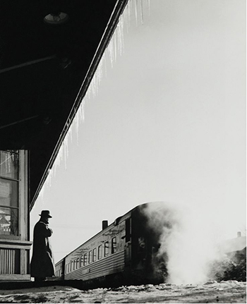 man waitiing for train