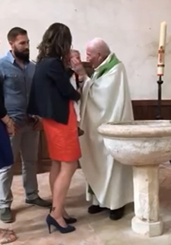 Priest slaps a baby at baptism - France