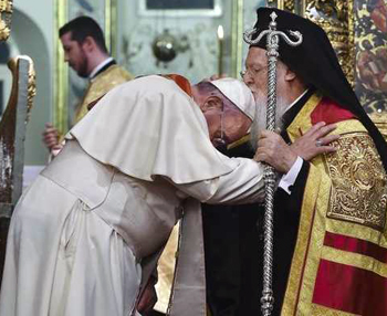 Francis bows to patriarch bartholomew