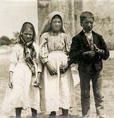 A photograph of the three seers of Fatima