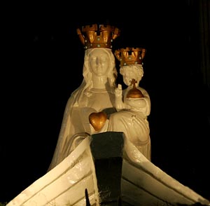 A statue of the Virgin and Child in a boat