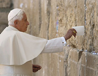 Benedict leaving a message at the wailing wall